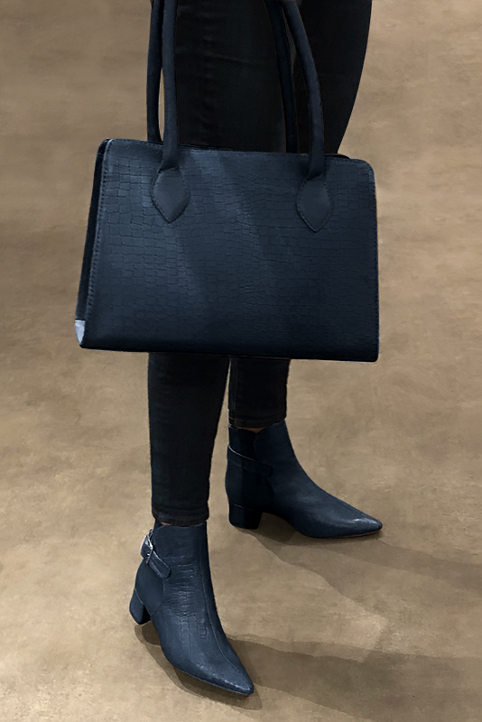 Denim blue women's ankle boots with buckles at the back. Tapered toe. Low flare heels. Worn view - Florence KOOIJMAN